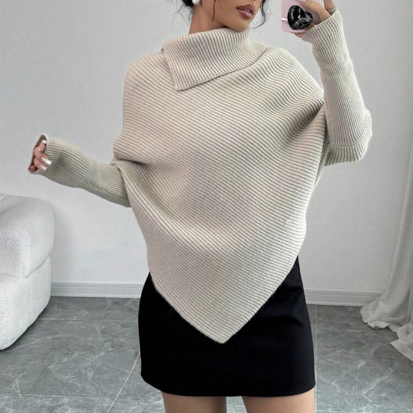 Women oversized knitted sweater with high collar and asymmetrical shape Lune London