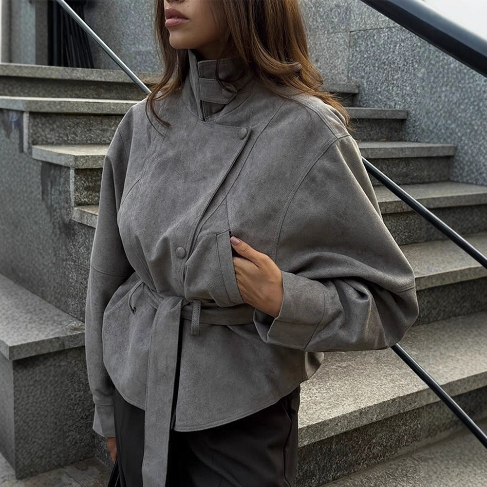 Women's short jacket made of faux suede with a high stand-up collar, waist belt, and boxy oversized silhouette Amarae
