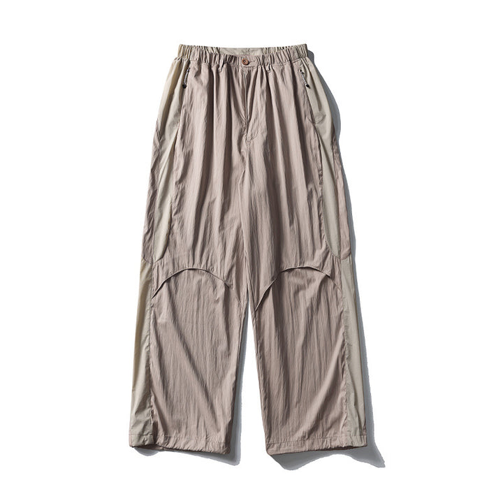 Men's loose technical nylon cargo pants with elastic waistband and panel details Amarae