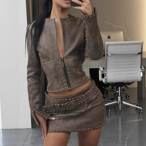 Fashion leather jacket for women with studs and a short skirt Amarae