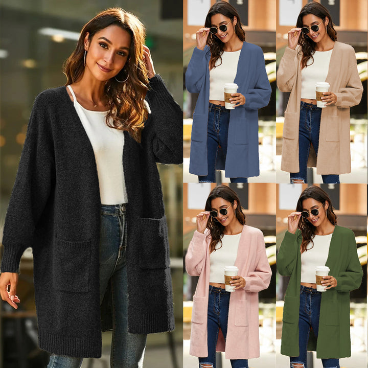 Ladies chunky knit kimono cardigan with open sleeves and practical pockets Lune London