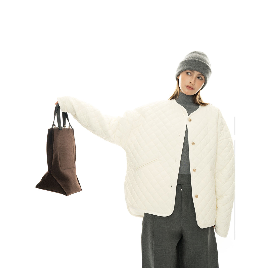 Women’s light padded oversized quilted jacket with round neckline and patch pockets Amarae