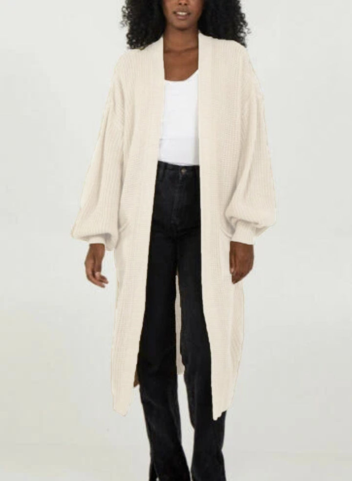 Knitted coat for women with voluminous sleeves and an open cut Lune London