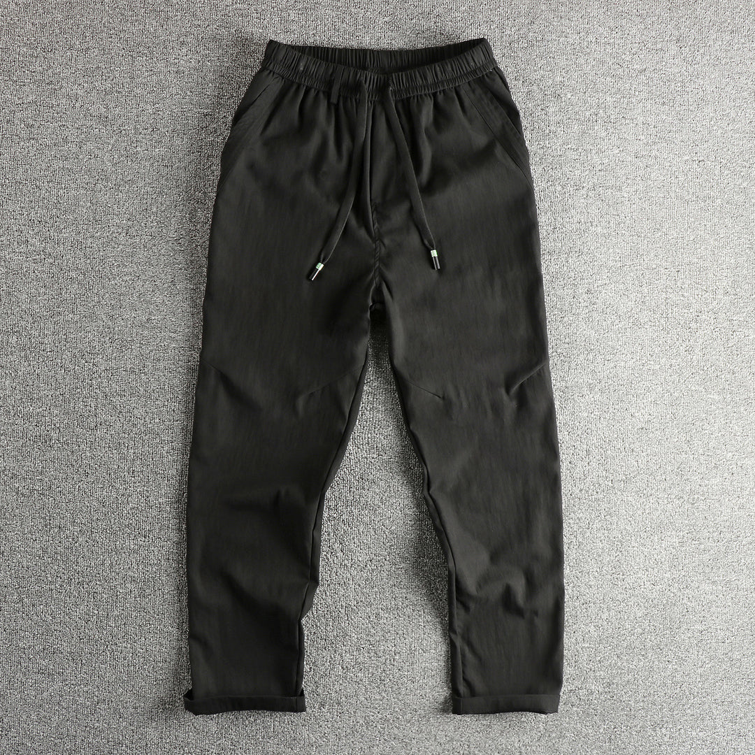 Men's athletic leisure pants with elastic waistband and practical drawstring Lune London