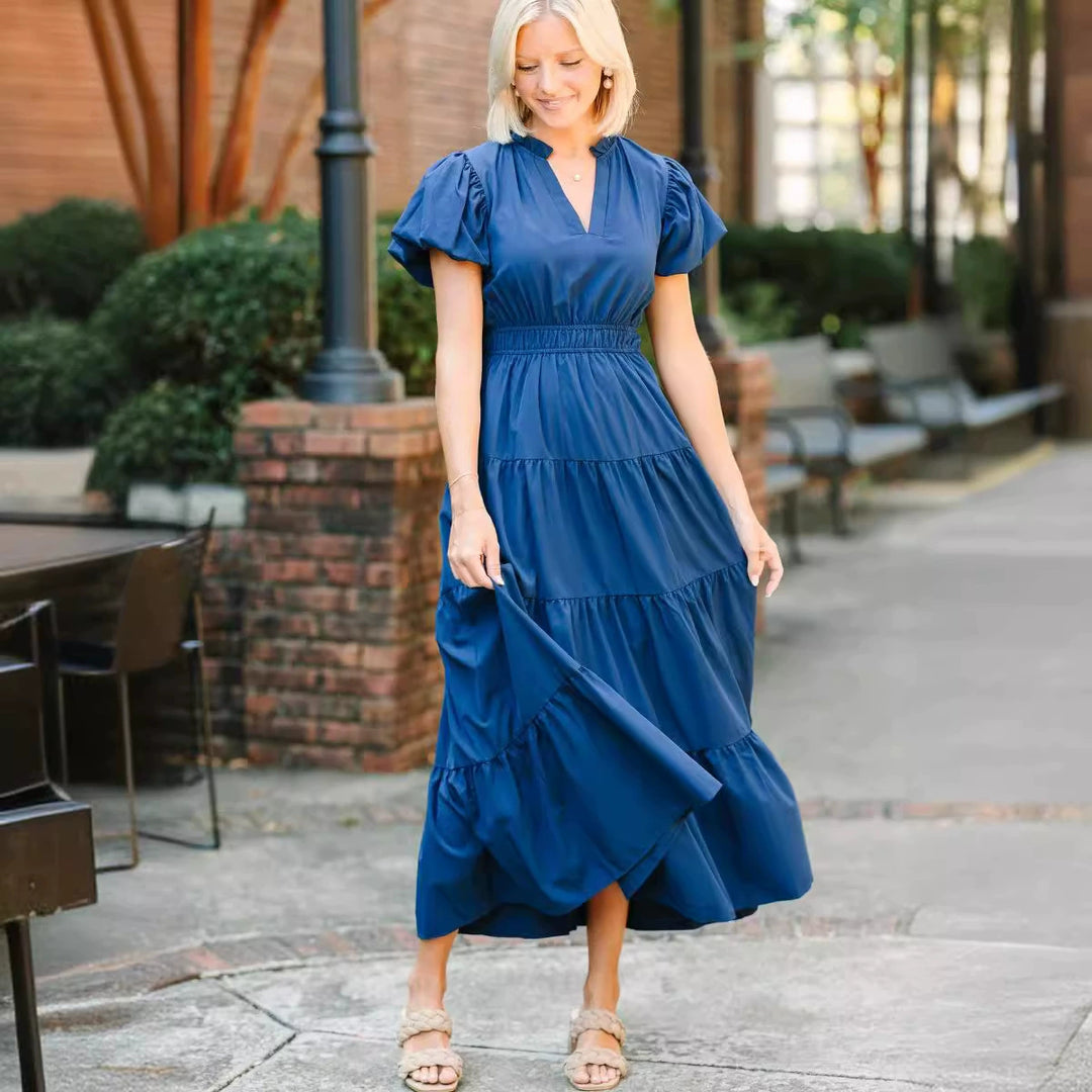 Women's midi dress with voluminous ruffles and flattering cut Lune London