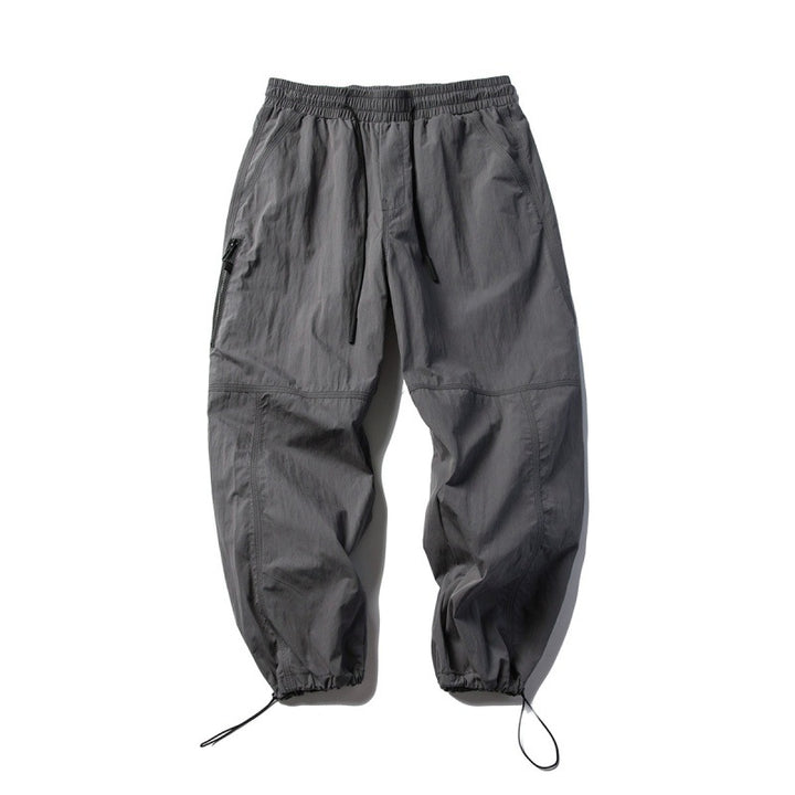 Unisex Technical Cargo Pants in Baggy Cut with Drawstring Waist and Adjustable Leg Closures Amarae