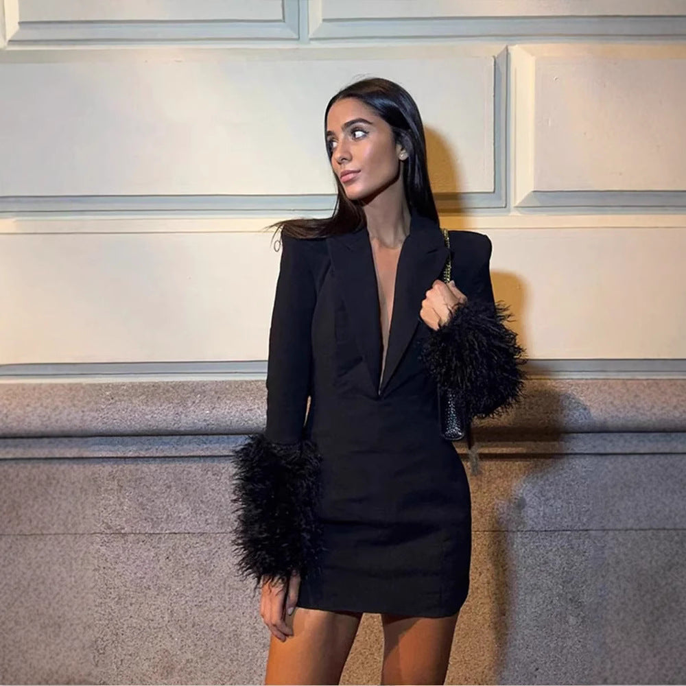 Sexy mini dress for women with deep V-neck and glamorous feather sleeves Lune London