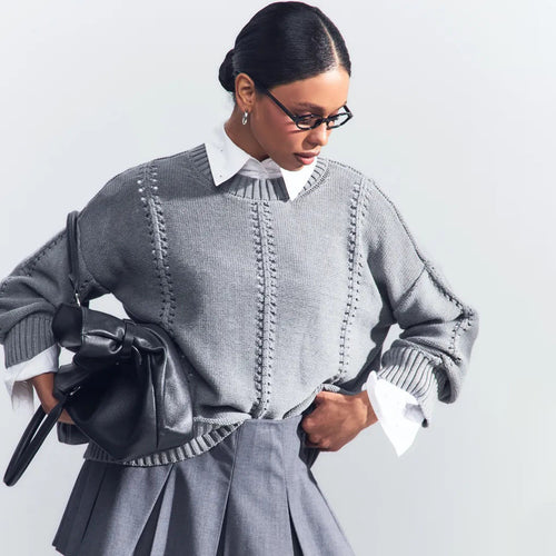 Casual knitted sweater for women with airy design elements and drop shoulders Amarae