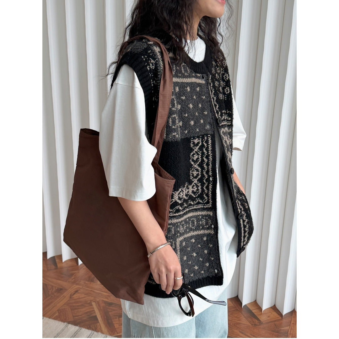 Women’s jacquard knitted vest with button placket and ribbed neckline Amarae