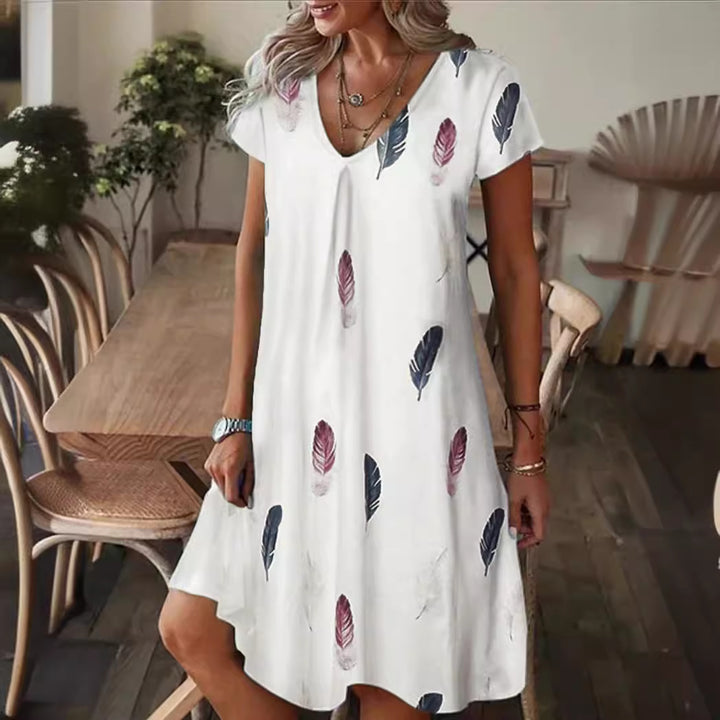 Fluid V-neck midi dress for women with abstract pattern Lune London