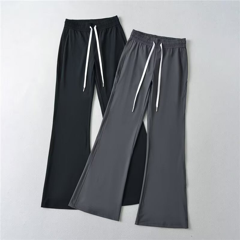 Pantalons évasés sportifs pour femmes avec taille élastique et poches pratiques Chic & Stil