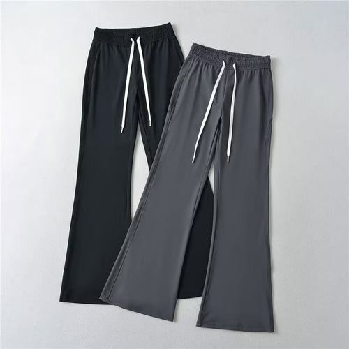 Pantalons évasés sportifs pour femmes avec taille élastique et poches pratiques Chic & Stil