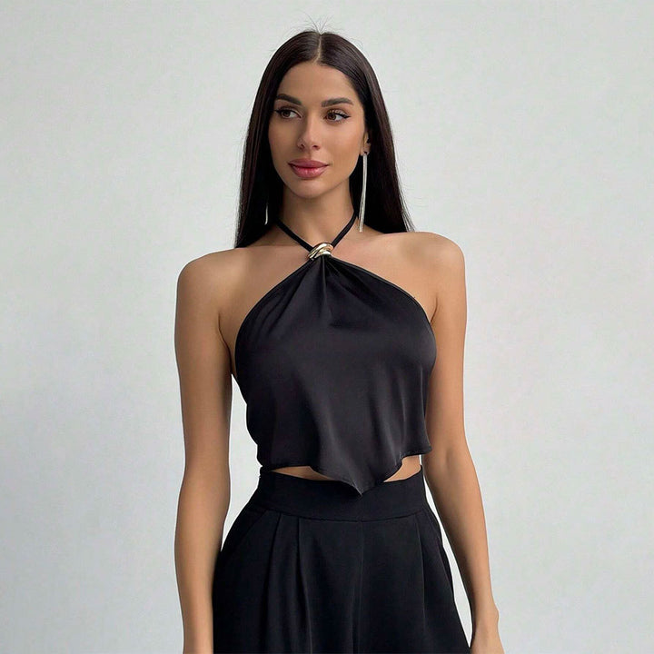 Haut élégant à encolure halter pour femmes avec tissu brillant et nœud décoratif Chic & Stil
