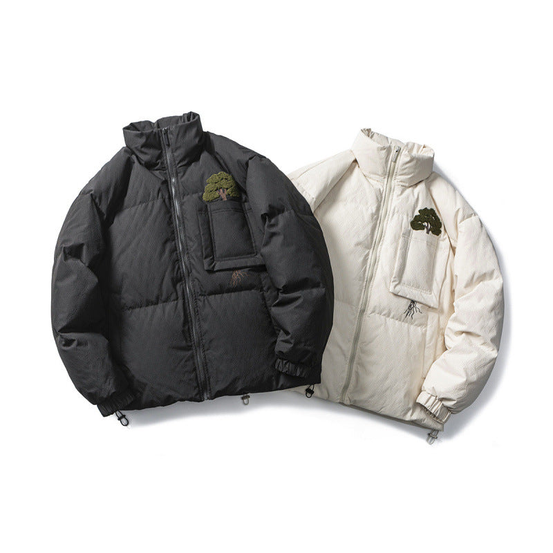 Unisex Kastig padded stand-up collar jacket with tree embroidery, chest flap pocket and drawstring hem Amarae