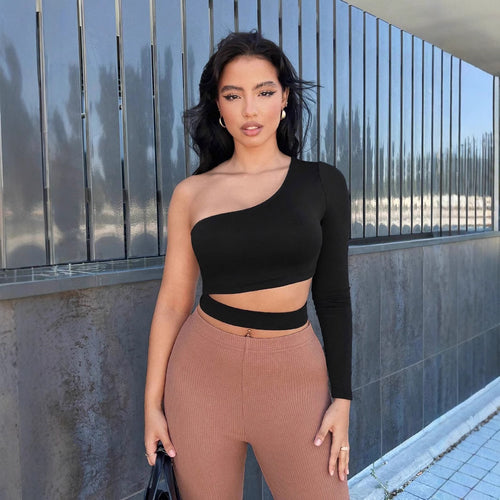 Asymmetrical cropped women's top with one long sleeve Chic & Stil