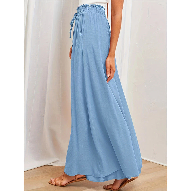 Women's loose summer pants with elastic waist and practical pockets Lune London