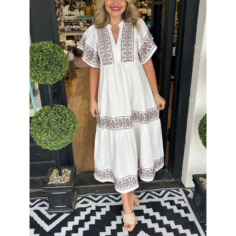 Maxi dress for women with refined embroidery details and a flared cut Lune London