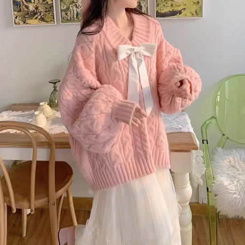 Ladies Large knitted sweater with bow detail and cable knit pattern Amarae