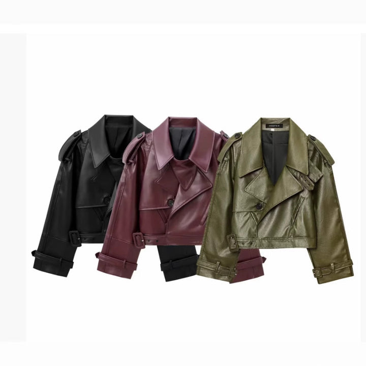 Faux leather biker jacket for women with a trendy cropped design, adjustable belt, and decorative buttons Lune London