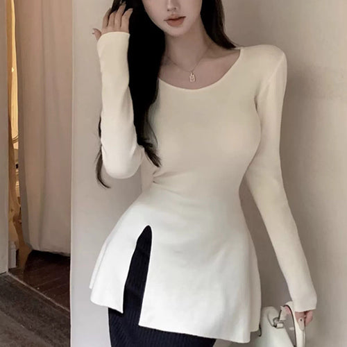 Women's long sleeve top with asymmetric cut and elegant detail