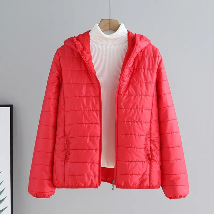 Ladies quilted transitional jacket with practical pockets and hood Amarae