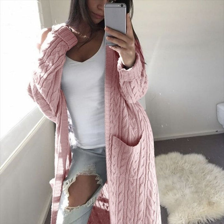 Knitted coat for women with cable pattern and practical pockets Lune London