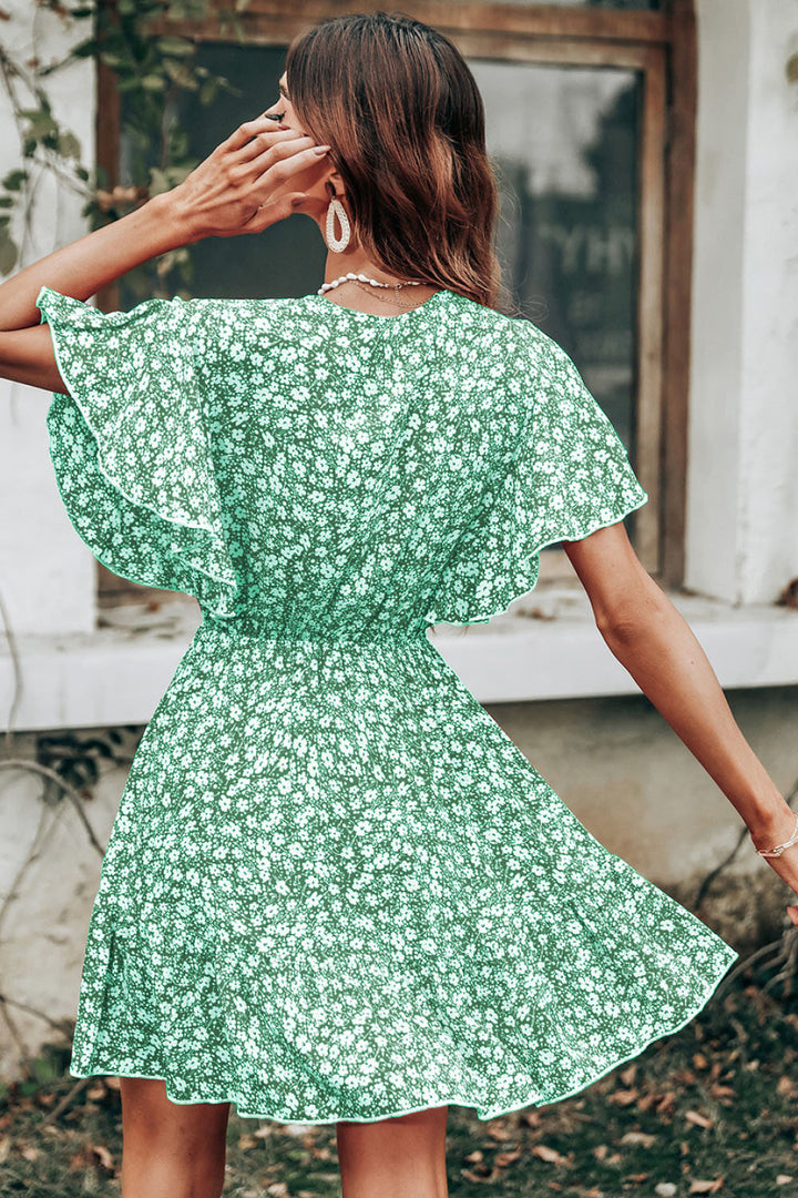 Ladies Twirl Dress with Flowing Floral Sleeves Lune London