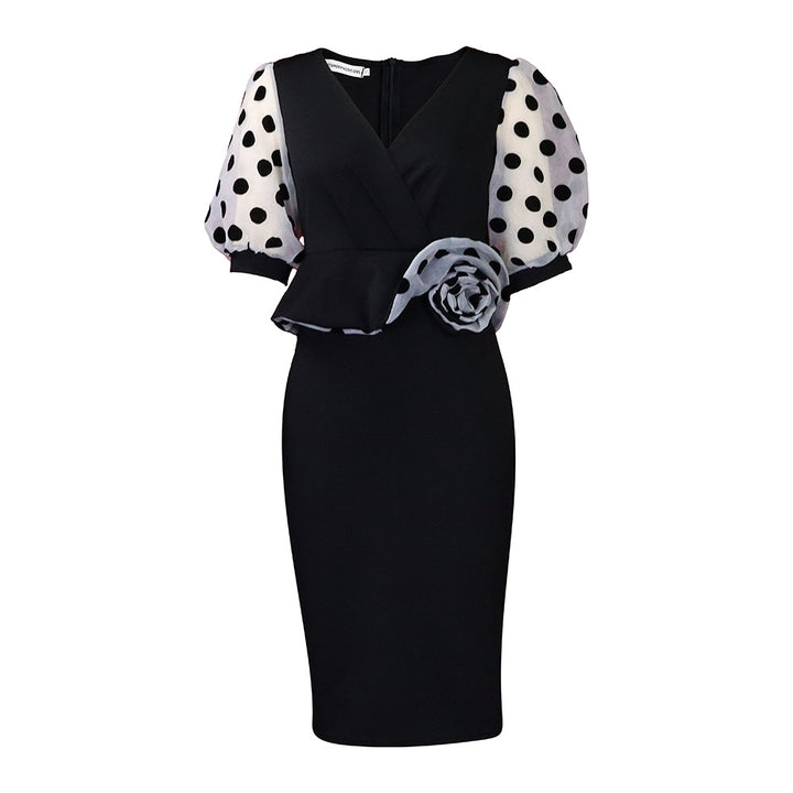 Fitted cocktail dress for women with sheer puff sleeves and floral accent Lune London