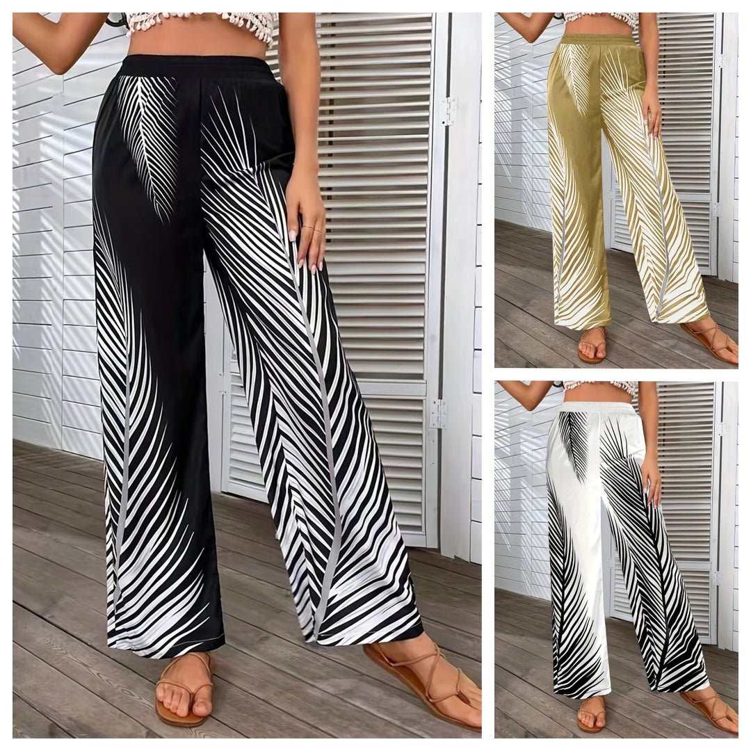 Elegant and lightweight palazzo pants for women with palm tree pattern Lune London