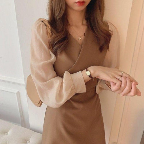 Ladies dress with stylish puff sleeves and elegant waistline