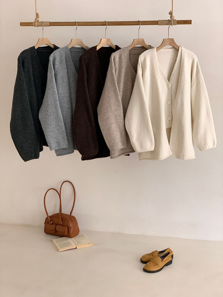 Gilet en tricot décontracté pour femmes avec fermeture à boutons et manches volumineuses Chic & Stil