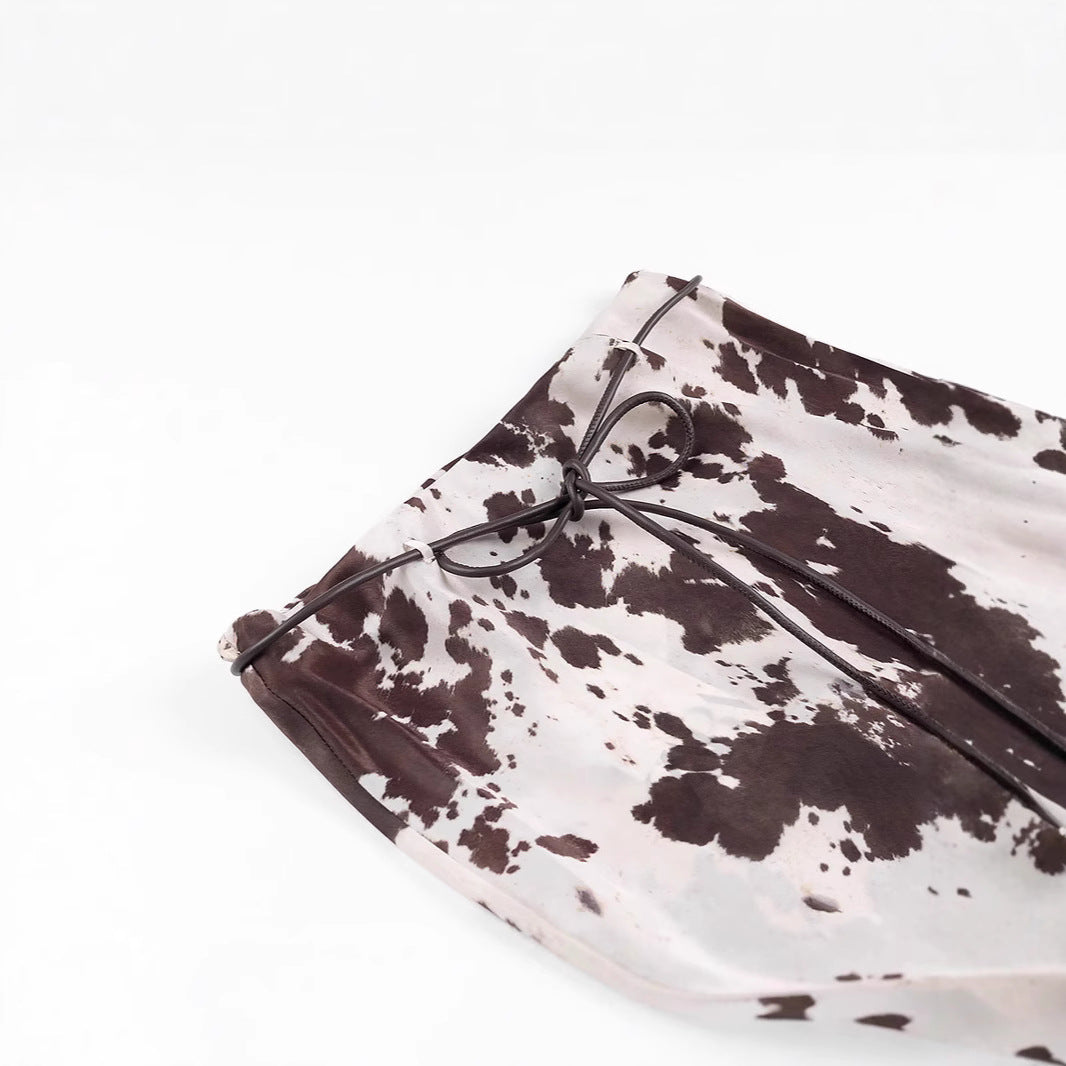 Women's loosely cut shirt blouse with cow spot print and concealed button placket Amarae