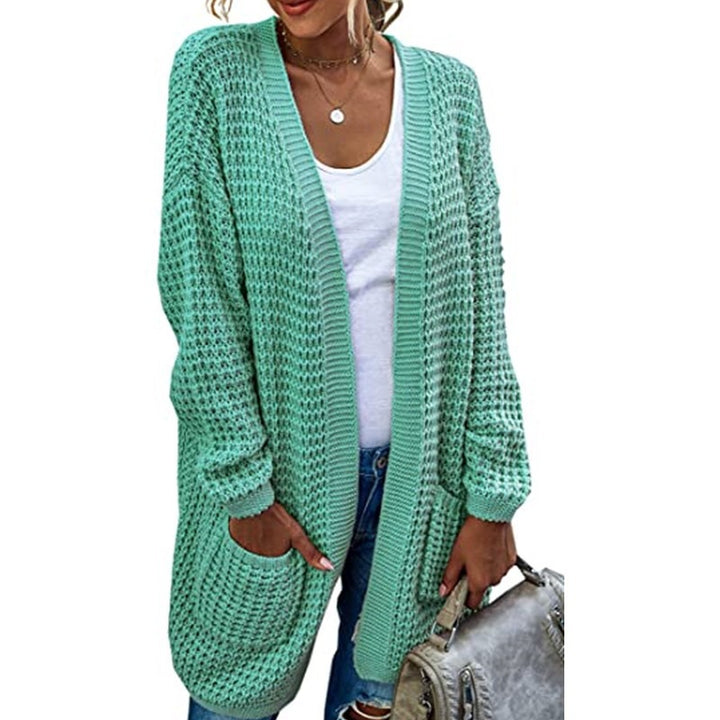 Chunky knit women’s cardigan with a relaxed fit and practical pockets Lune London
