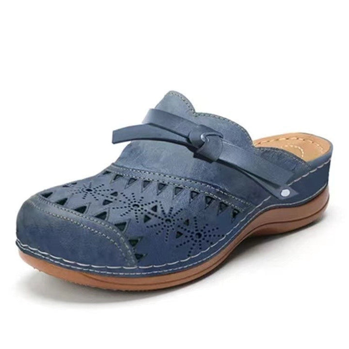 Women's Comfortable Clogs with Filigree Cutout Design and Elegant Strap Lune London