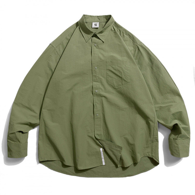 Unisex Oversize Shirt made of lightweight cotton blend with dropped shoulder and chest pocket Amarae