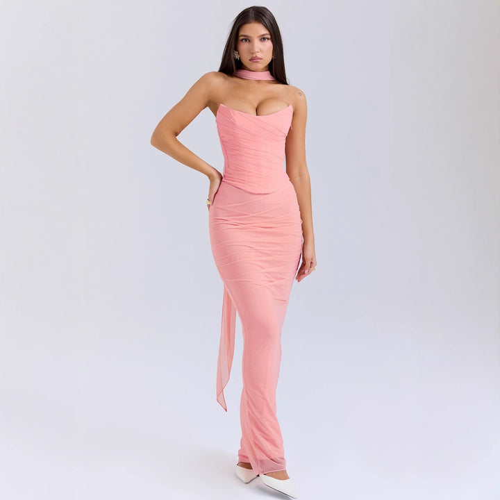 Women's form-fitting evening dress with off-shoulder design and sophisticated draping Lune London