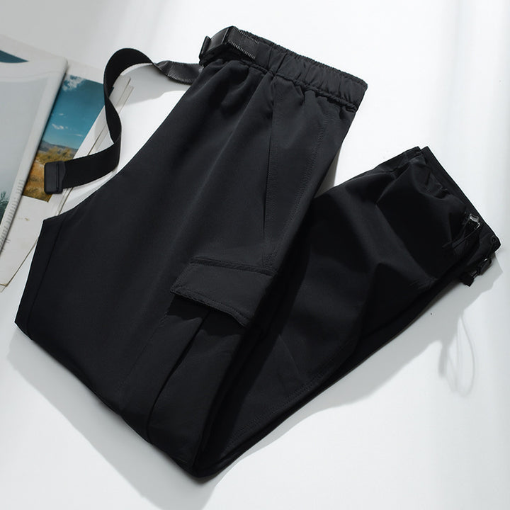 Men's cargo joggers with elastic waistband, drawstring, adjustable leg cuffs, and patch pockets.