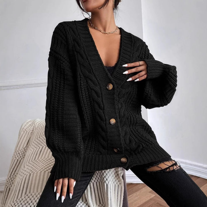 Thick knitted jacket for women with characteristic twisted design Lune London