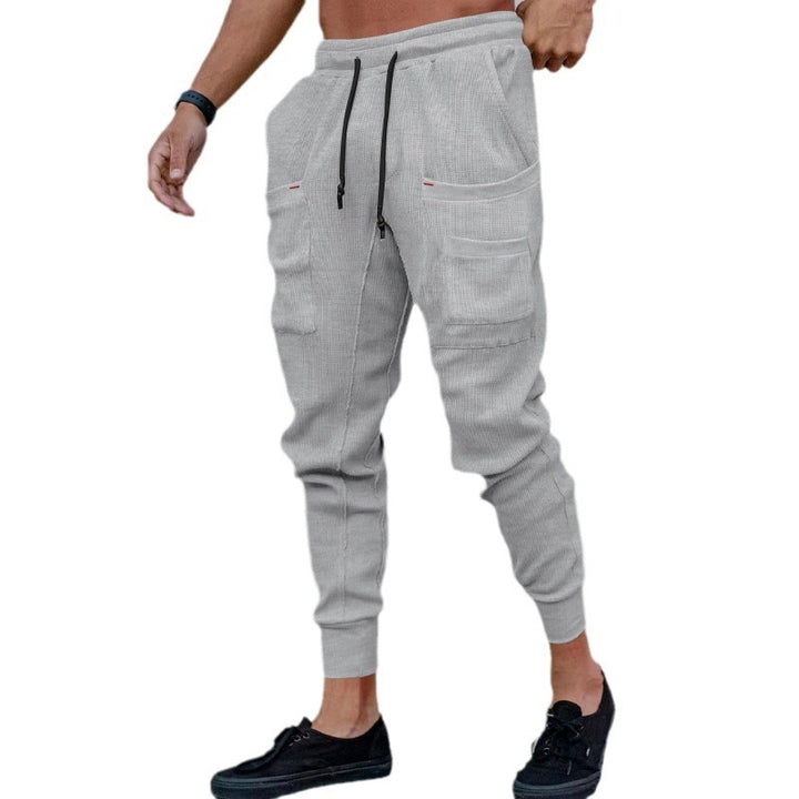 Casual men's jogger pants with practical side pockets and elastic waistband Lune London