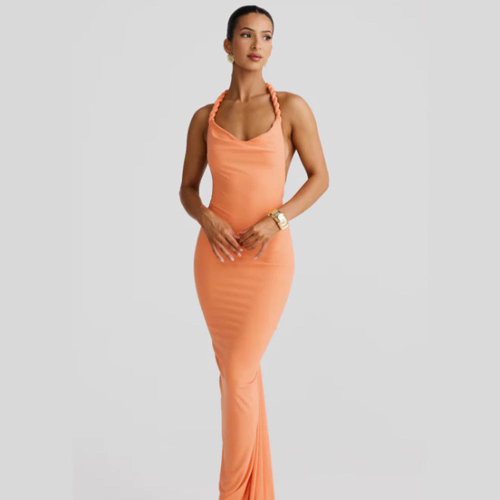 Women figure-hugging evening dress with elegant halter design and swinging hem Lune London