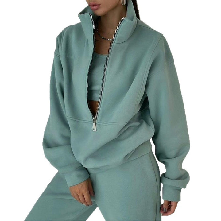Women's sporty sweatshirt with high collar and practical zipper Chic & Stil