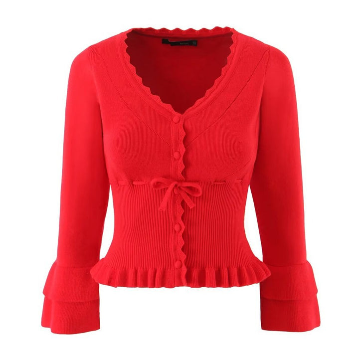 Short sleeve knitted jacket for women with ruffle details and button closure Lune London