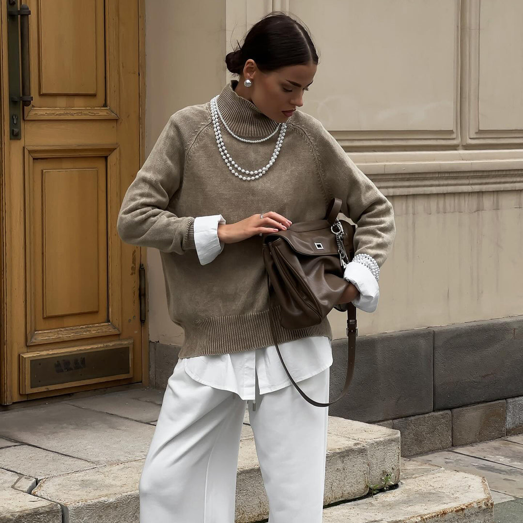 Ladies comfortable knitted sweater with high collar and elegant sleeve cuffs Lune London