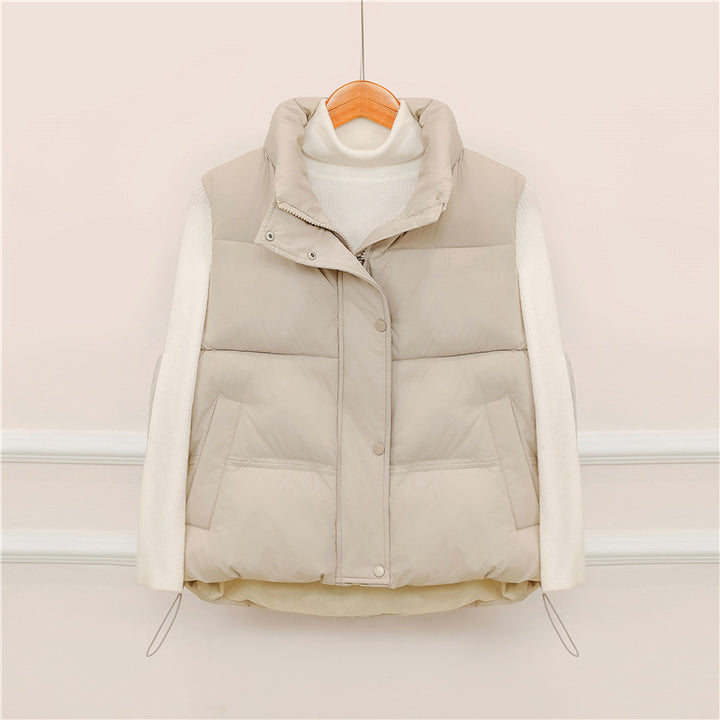 Sporty quilted vest for women with high collar and practical pockets Lune London