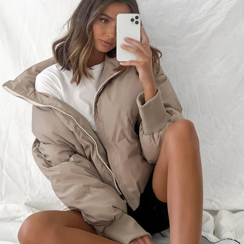 Women's casual quilted jacket with hood and elastic cuffs Chic & Stil