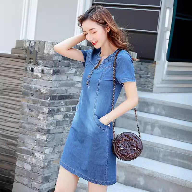 Women’s denim dress in a casual cut with button details and practical pockets Lune London