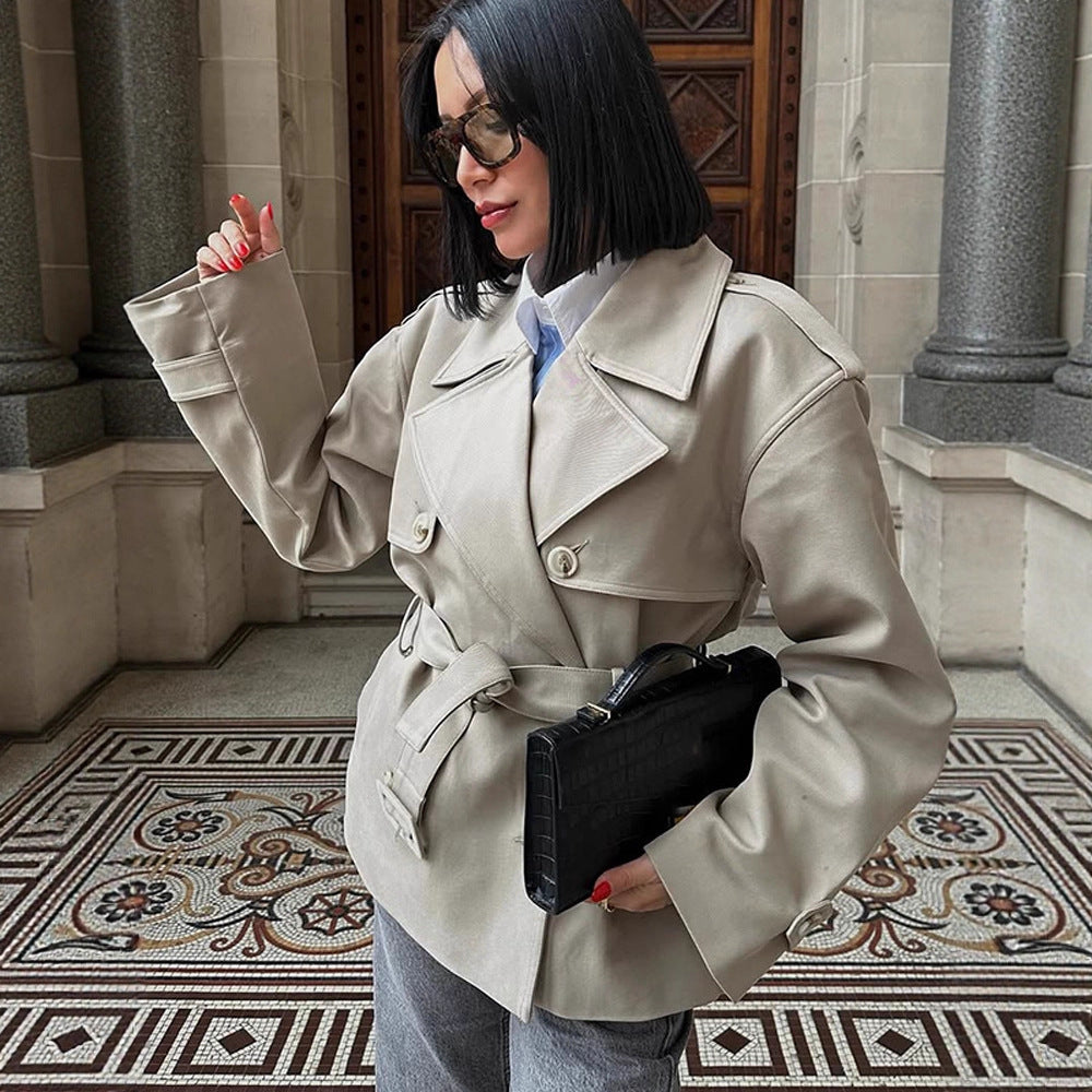 Women's short trench-style jacket with a tailored tie belt and wide sleeves Amarae
