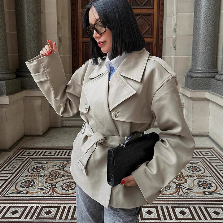 Women's short trench-style jacket with a tailored tie belt and wide sleeves Amarae