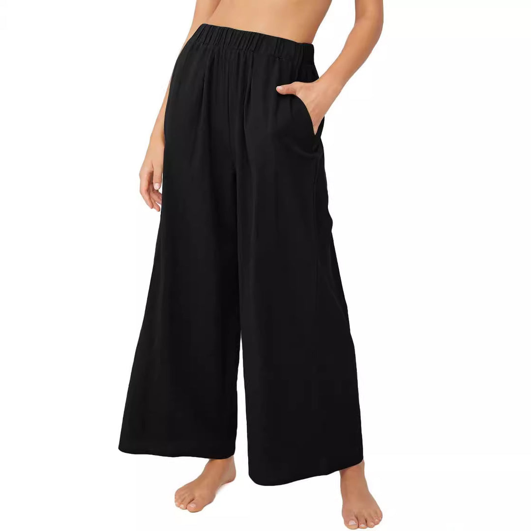 Wide palazzo pants for women with elastic waistband and side pockets Lune London
