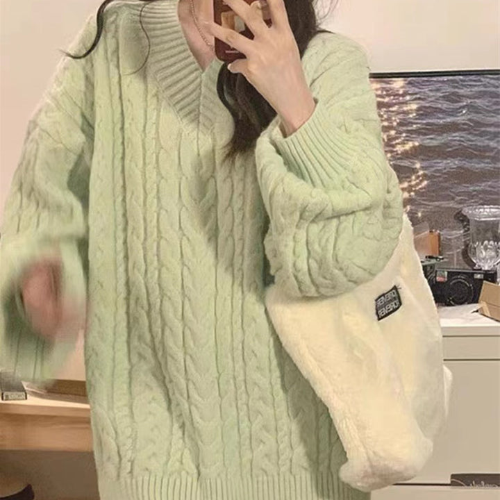 Pull en tricot épais pour femmes avec col en V et manches volumineuses Chic & Stil